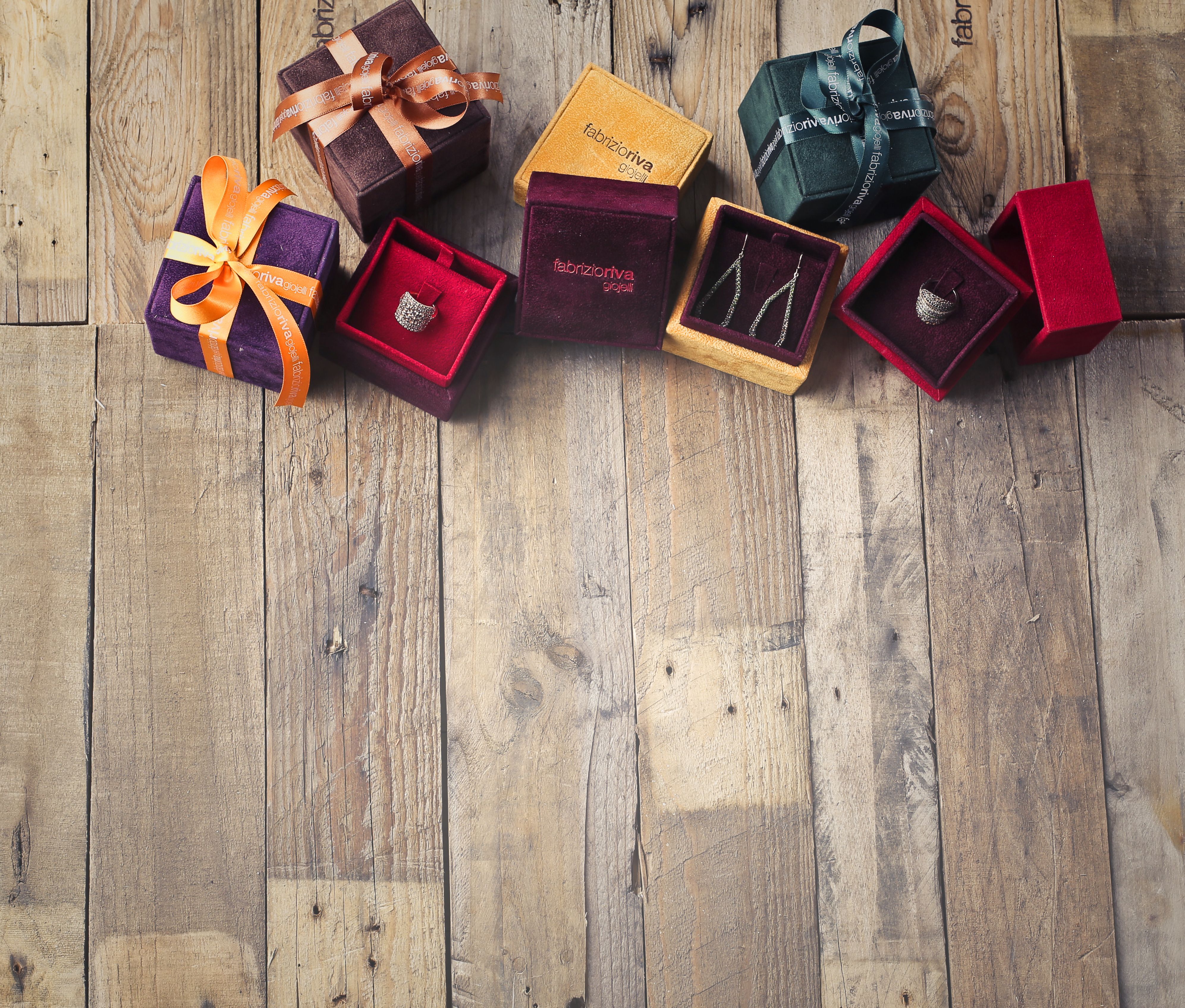Curated gift boxes arranged on a wooden table